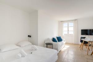 Posteľ alebo postele v izbe v ubytovaní Nice studio with a view on Antibes' port - Welkeys