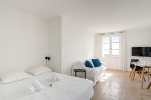 Posteľ alebo postele v izbe v ubytovaní Appartement Portolan - Welkeys