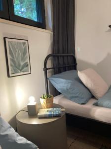 Posteľ alebo postele v izbe v ubytovaní DAS ERWIN Design-Bungalow (Nähe Velden/Wörthersee)