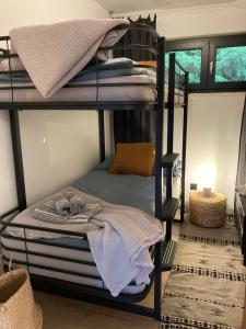 Posteľ alebo postele v izbe v ubytovaní DAS ERWIN Design-Bungalow (Nähe Velden/Wörthersee)