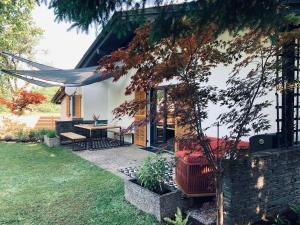 Vonkajšia záhrada v ubytovaní DAS ERWIN Design-Bungalow (Nähe Velden/Wörthersee)
