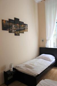 Postel nebo postele na pokoji v ubytování Sonnenberg-Villa Brunner Apartments