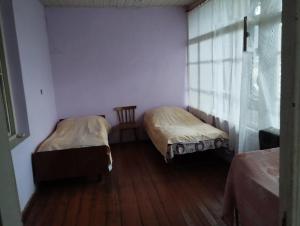 Ένα ή περισσότερα κρεβάτια σε δωμάτιο στο B&B Edem