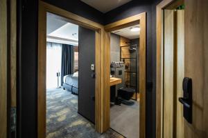 Posteľ alebo postele v izbe v ubytovaní 4 Évszak Erdeihotel**** - Mátrafüred