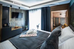 Posteľ alebo postele v izbe v ubytovaní 4 Évszak Erdeihotel**** - Mátrafüred