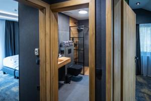 Posteľ alebo postele v izbe v ubytovaní 4 Évszak Erdeihotel**** - Mátrafüred