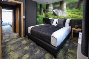 Posteľ alebo postele v izbe v ubytovaní 4 Évszak Erdeihotel**** - Mátrafüred