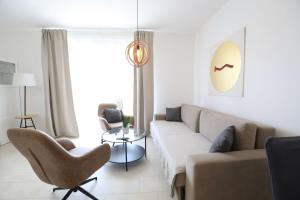 Posezení v ubytování Smil'e Apartments