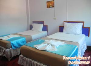 Кровать или кровати в номере Nam Pueng Place 1