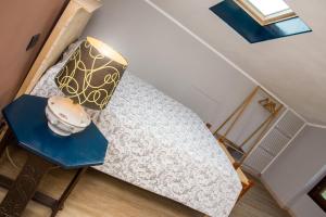 Posteľ alebo postele v izbe v ubytovaní B&B Miellò nelle Langhe
