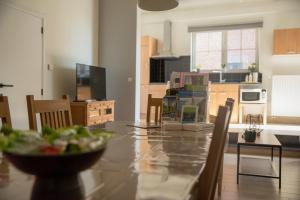 Kuchyň nebo kuchyňský kout v ubytování Vakantiewoningen Pomona