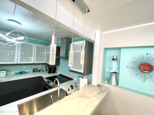 a kitchen with a sink and a counter top at Luxury Suite in Marin - Between San Francisco, Napa & Sonoma Wine Country in San Rafael +38 photos