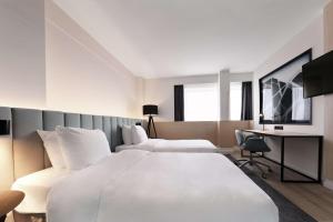 Sjónvarps- og/eða afþreyingartæki á Radisson Blu Hotel, Hasselt