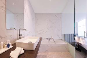 Baðherbergi á Radisson Blu Hotel, Hasselt