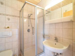 a bathroom with a shower and a sink at Haus Sporer in Gerlosberg