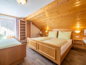 Posteľ alebo postele v izbe v ubytovaní Apartment Rosi