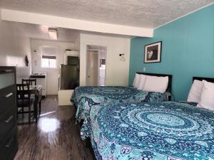 Cama ou camas em um quarto em Plainview Motel