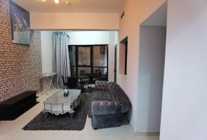 Posezení v ubytování Beautiful 2 Bedrooms + Hall Rental Unit in Marina Escan807