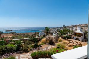 a garden with a view of the ocean at Aelion Villa in Vari