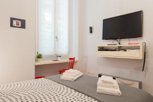 Televízia a/alebo spoločenská miestnosť v ubytovaní The Best Rent - Apartment near Porta Romana