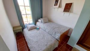 Posteľ alebo postele v izbe v ubytovaní Villa VISTALEGRE relax con increíbles vistas