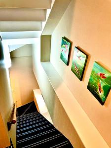 Postel nebo postele na pokoji v ubytování AYA Hotel