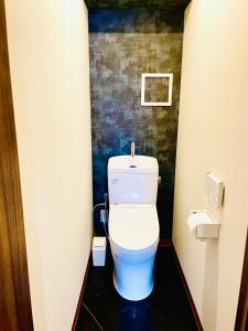 Koupelna v ubytování AYA Hotel