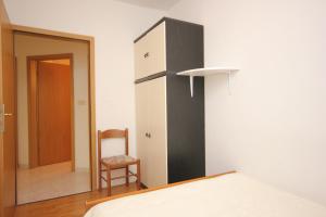 Posteľ alebo postele v izbe v ubytovaní Apartment Vis 2470a