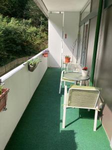 A balcony or terrace at Kurhaus Apartment King Size Bett 180x200