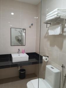 Baðherbergi á T SQUARE HOTEL (IPOH)