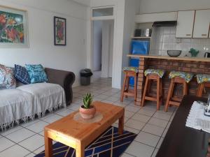 a living room with a couch and a table at Seabrook 306 in Margate