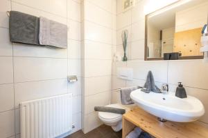 Koupelna v ubytování Aparthotel Stadler