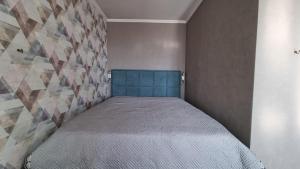 Postel nebo postele na pokoji v ubytování Apartment (1 комн) на Площади Республики