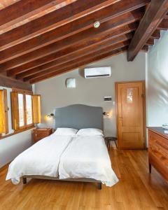 Postel nebo postele na pokoji v ubytování Hotel Villa Bonelli
