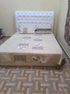 Postel nebo postele na pokoji v ubytování Nor Su Homestay