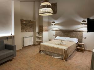 Ένα ή περισσότερα κρεβάτια σε δωμάτιο στο Casa Bulbón
