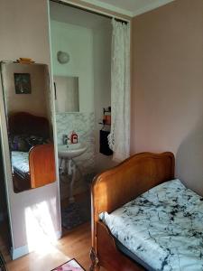 Postel nebo postele na pokoji v ubytování Skogshemmet