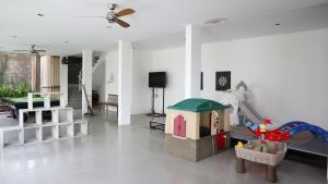 A television and/or entertainment centre at K Gallery Hotel