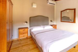 Postel nebo postele na pokoji v ubytování Hotel Villa Bonelli