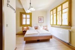 Postel nebo postele na pokoji v ubytování Watzdorfer Geleitschenke und Herberge