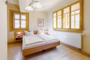 Postel nebo postele na pokoji v ubytování Watzdorfer Geleitschenke und Herberge