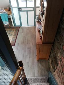 an overhead view of a room with a wooden floor at Shoe Trader's Terrace in Rathmullan