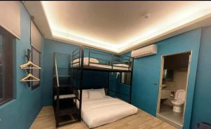 Voodi või voodid majutusasutuse Fangliao Chun Lai Homestay toas