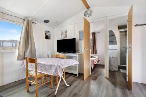 A television and/or entertainment centre at COUNTRY HOME