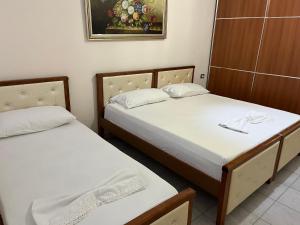 Letto o letti in una camera di Amal Vlora Apartament