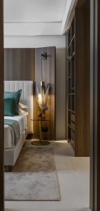 Postel nebo postele na pokoji v ubytování We Me Suite Hotel