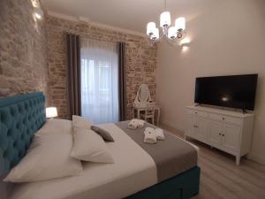 Posteľ alebo postele v izbe v ubytovaní Apartment Antique Zadar - City Center
