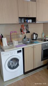 A kitchen or kitchenette at studio by the Pool in Aspen Heights Bansko