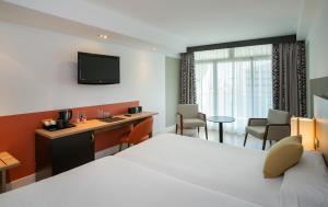 TV a/nebo společenská místnost v ubytování Medplaya Hotel Flamingo Oasis