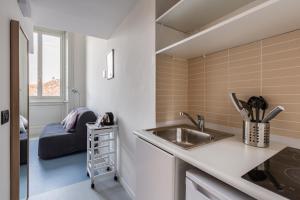 Köök või kööginurk majutusasutuses Central Studio APTS Milano-Corso Magenta
